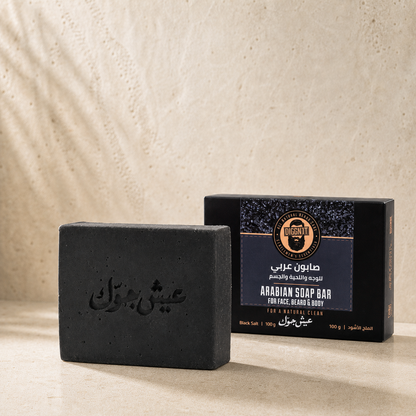 Diggn'It Black Salt Arabian Soap Bar and carton on a pale mineral surface