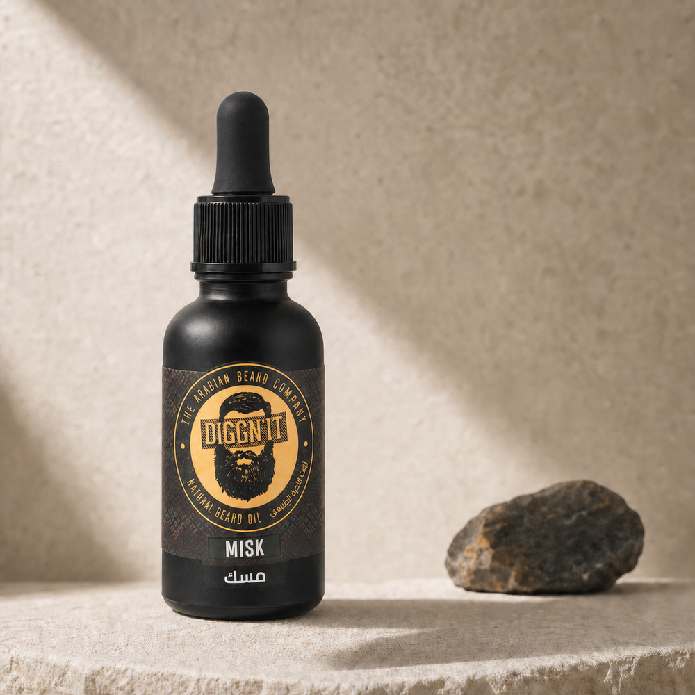 Diggn'It Misk Arabian Beard Oil bottle on a warm ivory mineral backdrop